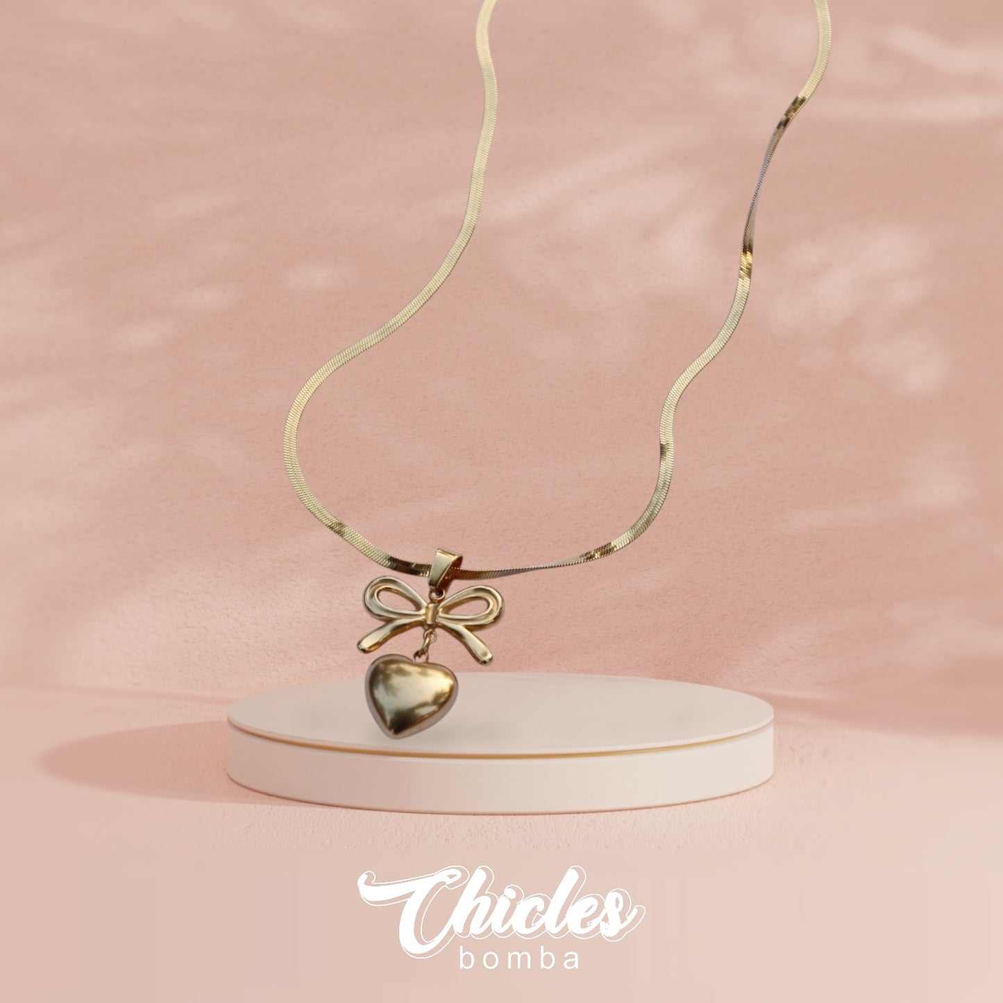 Collar corazón moño